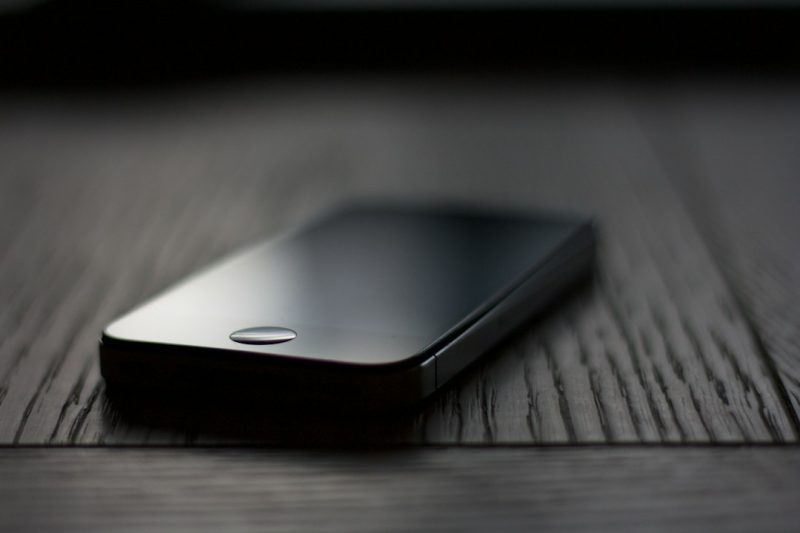 Photo by Nicolas Thomas - EntreResource.com shallow focus photography of space gray iPhone 5s